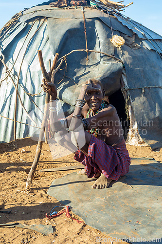 Image of Dasanesh woman in traditional African village, Omorate, Omo Valley, Ethiopia