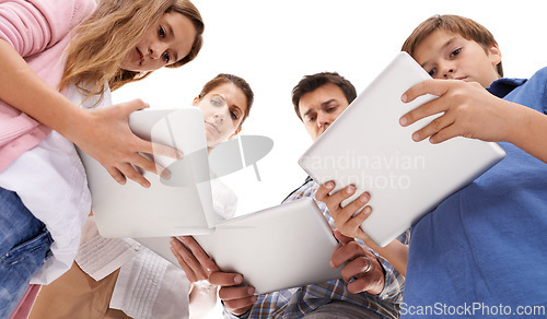 Image of Tablet, family and children on a white background for internet, website and online games. Family, distractions and mom, dad and kids on digital tech for streaming, connection and videos in studio