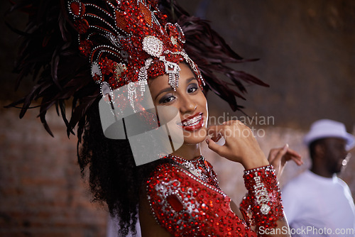 Image of Carnival, dancing and woman in portrait for event in Brazil, dancer with gemstone outfit and feather head gear outdoor. Music, samba and happiness for performance and culture with festival and talent