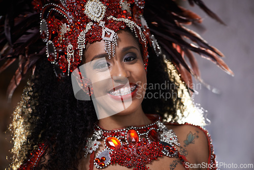 Image of Carnival, dance and woman in portrait for performance in Brazil, dancer with gemstone outfit and feather head gear outdoor. Music, samba and happiness for event and culture with festival and talent