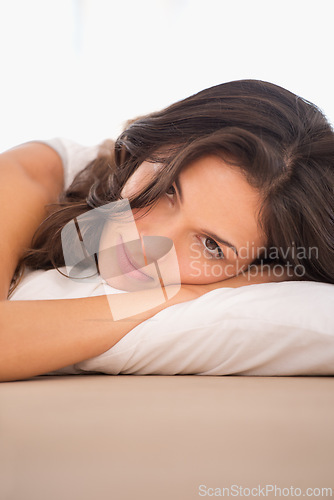 Image of Tired, relax or portrait of woman in bed for resting with fatigue or peace alone in home or house. Face, morning or calm female person in apartment on break, time off or pillow to start day or chill