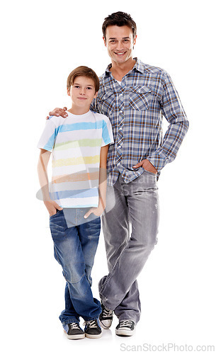 Image of Happy dad, portrait and hug with kid in fashion for family or bonding on a white studio background. Father, son or child with smile in casual clothing, support or trust for parenthood or childhood