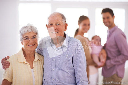 Image of Senior, couple and happy portrait in home with hug, family and commitment to marriage in living room. Elderly, man and woman with face, smile and embrace in lounge of house for romance, love or care