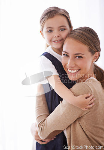 Image of Mother, kid and hug for love and security, happy in portrait with bonding and care at family home. Safety, trust and affection with embrace to nurture and people with joy and comfort for connection