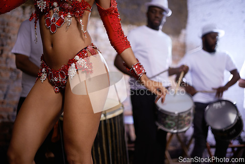 Image of Woman, dancer and samba for carnival and music festival or street performance with costume closeup. Body of person dancing with drums for event, tourism and celebration or culture in Rio de Janeiro