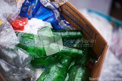 Image of Bottles, pollution and garbage or trash for litter, landfill and junkyard or destruction of climate. Closeup, waste and ecological disaster or problem, dispose and reuse or recycle for sustainability