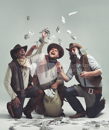 Image of Money, thief and western with celebration of people in studio on gray background for robbery or heist. Texas, crime and smile with man gang throwing cash from bag in air for illegal theft or stealing