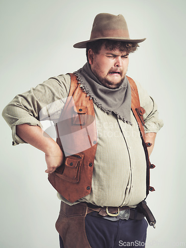 Image of Crying, cowboy and criminal with gun in studio mockup, outlaw and wild west character with pistol. Overweight texas man, bandit and vintage clothes or western costume and loser by white background