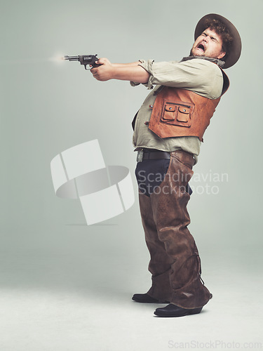 Image of Cowboy, man and shooting gun in studio, pistol or western fight isolated on a white background mockup space. Plus size, funny criminal and person with revolver, scared or screaming with fear in Texas