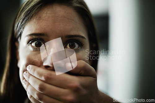 Image of Woman, portrait and hand for hostage or scared victim for danger crime or terror anxiety, terrified or stalking. Female person, mouth and fingers of criminal in America or panic, fear or kidnapping