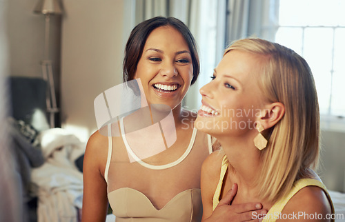 Image of Young women, happy and celebration in hotel room as friends, support and fashion to celebrate at gala event. Ladies night, bedroom and excited in elegant clothes and bonding together for formal party