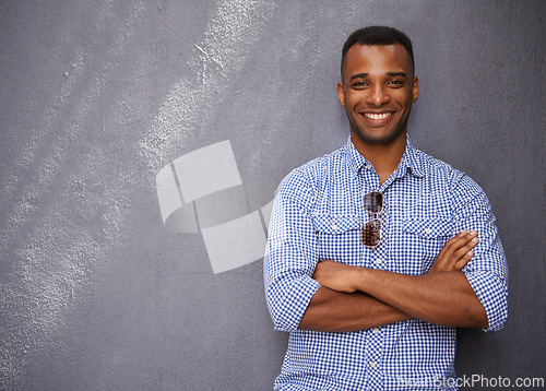 Image of Man, smile and fashion or style in portrait by wall background, cool outfit and mockup space. Happy black male person, university student and outdoors for aesthetic, confident and trendy clothes