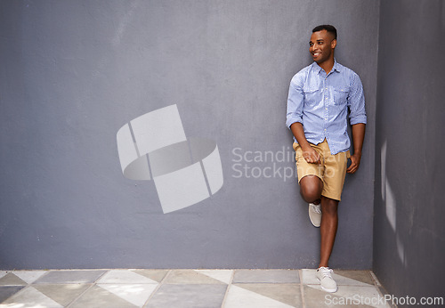 Image of Man, smile and urban fashion or style by wall background, full body and cool outfit on mockup space. Happy black male person, university student and city for aesthetic, confident and trendy clothes