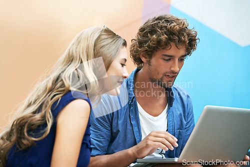 Image of Laptop, scholarship and couple of friends on university or college campus together for learning or study. Computer, smile or education with happy young man and woman students on academy stairs