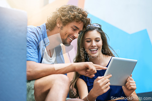 Image of Tablet, scholarship and couple of friends on university or college campus together for learning or study. Technology, smile or education with happy young man and woman students on academy stairs