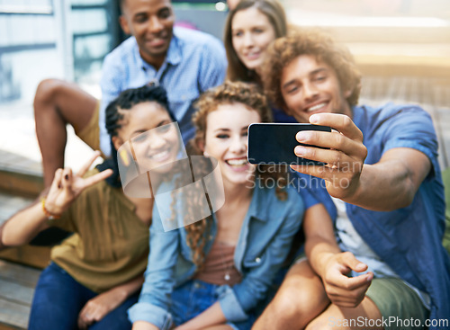 Image of Hand, students and group or smile for selfie at university campus for profile picture update or social media post. Men, women and happy friends with technology for memory, diversity and college fun