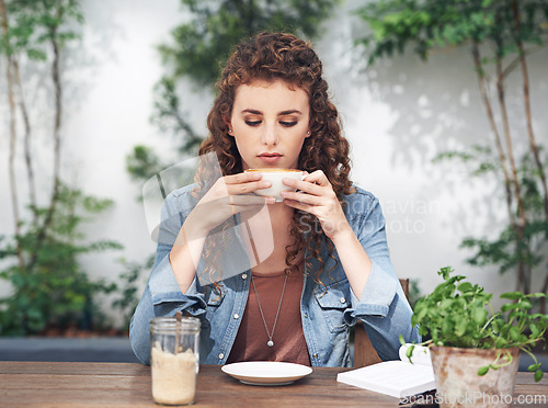 Image of Female person, thinking and coffee at cafe in outdoor, fashion and day dream with cup and doubt. Woman, bistro and relaxation with cappuccino, journalist and contemplate at breakfast or lunch