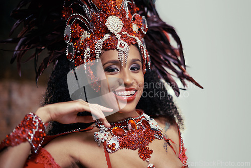 Image of Samba, carnival or happy woman in costume or portrait for celebration, music culture or band in Brazil. Event, party or proud girl dancer with smile at festival, parade or fun show in Rio de Janeiro