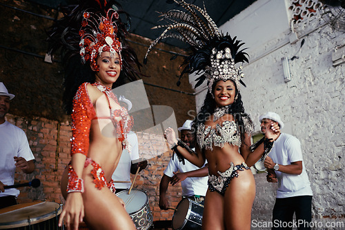 Image of Portrait, dance and women at carnival in costume for celebration, music culture and happy band in Brazil. Samba, party and friends together with smile at festival, parade or show in Rio de Janeiro