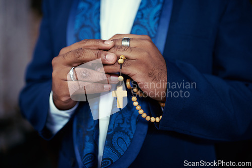 Image of Hands, prayer with beads and Christian man in worship for religion, trust and spiritual hope with peace. Holy love, mindfulness and preacher faith for God praying with gratitude, rosary and cross.