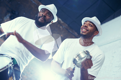 Image of Night, drum or men in band for festival playing an instrument in carnival in Rio de Janeiro, Brazil. Black people, live show or happy artists banging to create a beat in party or music performance