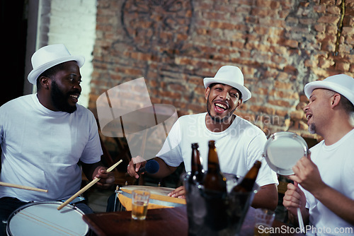 Image of Band, men and play samba music while singing for carnival night, event and live performance with drums. Musicians, artists and beer for fun show in rio de janeiro, happy and celebration for parade