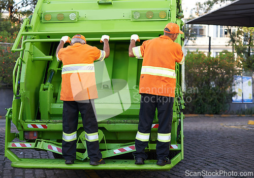 Image of Garbage truck, men and service for waste management and teamwork with routine and cleaning the city. Employees, recycle and environment with transportation and green energy with trash and sanitation