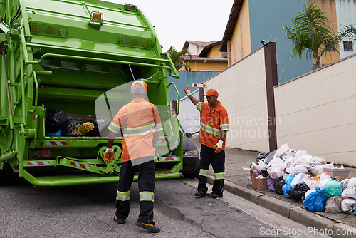 Image of Trash, people and working with garbage truck for waste management, service and maintenance. Urban, cleaning and men outdoor with industrial sanitation, collection of rubbish and infrastructure