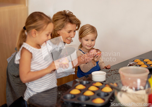 Image of Grandmother, child and cupcake helping in kitchen or icing decorations or sprinkles or sweet treat, bonding or teaching. Female person, siblings and baking ingredients or learning, dessert or recipe