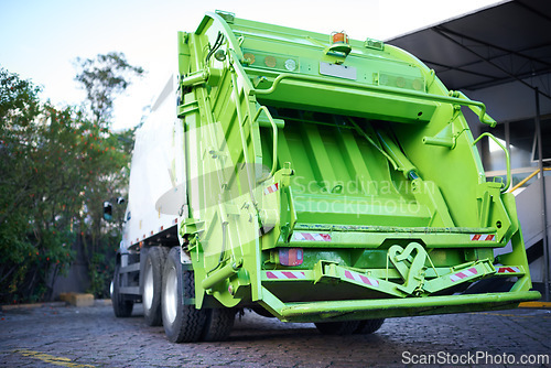 Image of Garbage truck, dirt and transport for collection service on street in city for public environment cleaning. Junk, recycling and vehicle with waste or trash for outdoor road sanitation or maintenance.