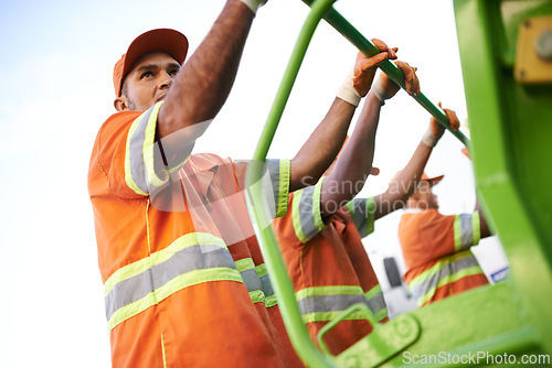 Image of Industry, waste management and garbage truck with men in uniform cleaning outdoor on city street. Job, service and male people working with rubbish for sanitation, maintenance or collection of dirt.