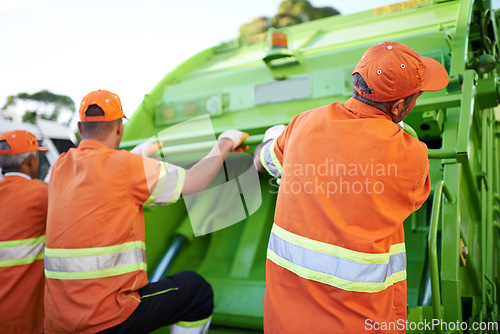 Image of Men, garbage truck and trash collection service for city pollution for cleaning, environment or teamwork. Male people, back and dirt transportation for sidewalk debris in New York, mess or litter