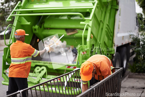 Image of Men, garbage truck and city container for collection service for public pollution for recycling, waste management or trash. Community worker, teamwork and plastic in New York for junk, refuse or dirt