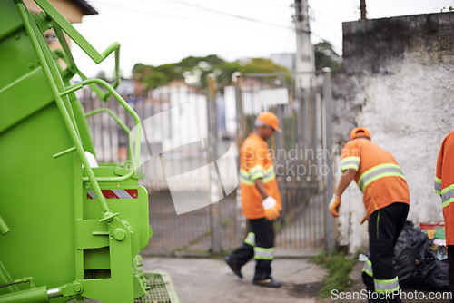 Image of Garbage truck, trash and people with collection service on street in city for public environment cleaning. Junk, recycling and men working with waste or dirt for road sanitation with transport.