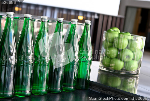 Image of Bottles and apples