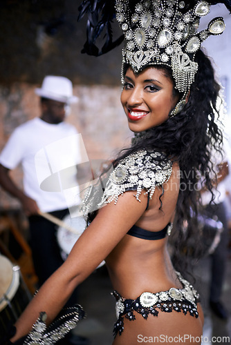 Image of Carnival, dance and portrait of woman in samba costume for festival, celebration or holiday party. Street, dancer and person in masquerade outfit for performance, culture or concert in Rio de Janeiro