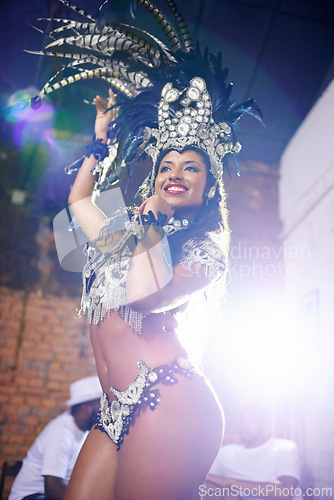 Image of Carnival, dance and woman in costume at night for festival, celebration and holiday party. Street, samba dancer and person in masquerade outfit for performance, culture and event in Rio de Janeiro