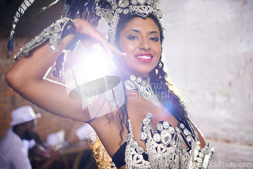 Image of Culture, dance and portrait of woman at carnival with costume for celebration, music and happy performance in Brazil. Samba, party and girl at festival, parade or show in Rio de Janeiro with smile.