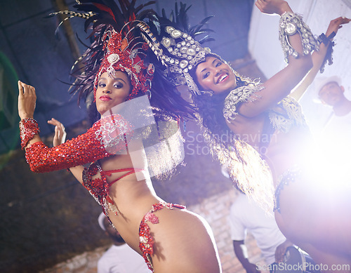 Image of Samba, dance and woman at carnival, festival and event in Brazil for summer celebration at night. Happy, dancer or creative fashion for salsa performance with energy, music or people at club to party