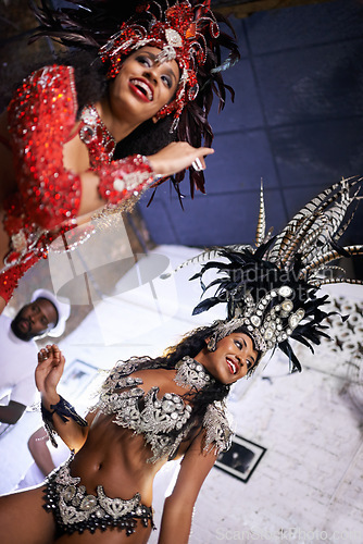 Image of Samba, dance and woman at carnival, festival and event in Brazil for summer celebration at night. Sexy, dancer or creative fashion for salsa performance with energy, music or people at club to party