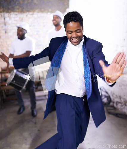 Image of Happy, dance and black man at event with music, band and samba in celebration of culture in Brazil. Drums, musician and person moving with creative performance at party and joy from salsa or talent