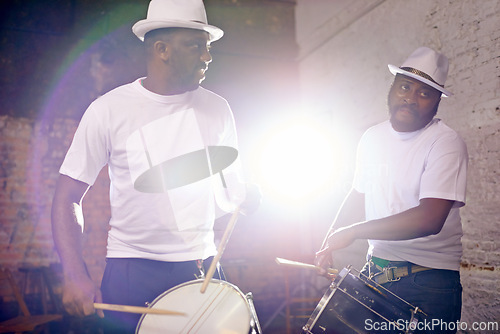 Image of Night, drum or men in band for carnival playing an instrument in festival in Rio de Janeiro, Brazil. Black people, show or group of male artists banging to create a beat in party or music performance