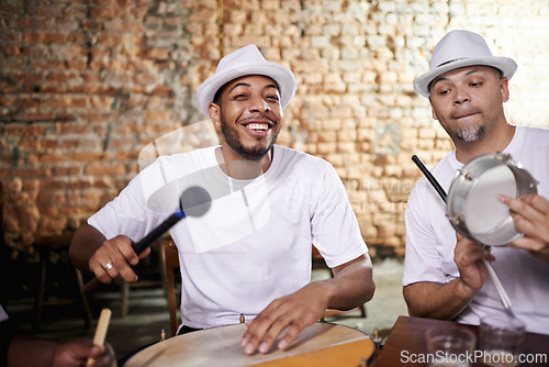 Image of Happy, man and music on drums for carnival, festival or performance with band at party. Night, club and musician smile in portrait with instrument for playing creative samba or salsa beat with rhythm