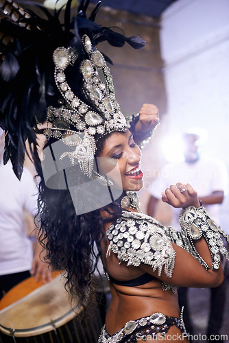 Image of Dance, performance and woman at carnival, festival and event in Brazil for summer celebration of culture. Samba, dancer and creative fashion salsa with energy to music or people at club or party