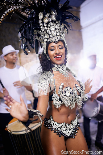 Image of Samba, dance and woman in performance at carnival, festival and event in Brazil for summer celebration of culture. Salsa, dancer and creative fashion at party with energy to music or people at club