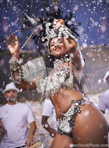 Image of Dance, performance and woman samba at carnival, festival and event in Brazil for summer celebration of culture. Happy, dancer and creative fashion for salsa, party and night with confetti and music