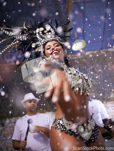 Image of Dance, performance and woman samba at carnival, festival and event in Brazil for summer celebration of culture. Happy, dancer and creative fashion for salsa, party and night with confetti and music