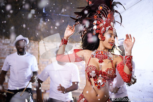 Image of Dance, performance and woman at carnival, festival and event in Brazil for summer celebration of culture. Salsa, dancer and creative fashion at club with energy for samba, music or people at party