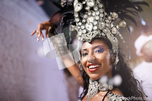 Image of Carnival, dancer and portrait of woman at festival, event or samba in Brazil for summer celebration of culture. Salsa, dancer and creative fashion with happiness from music or people at club or party