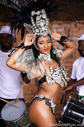 Image of Dancer, carnival and woman with band with smile, pride and culture with group for music performance in night. People, men and dancing girl at event, party or celebration for history in Rio de Janeiro